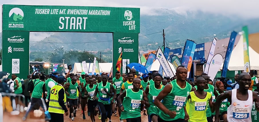 Madness in the Mountains: The Ultimate Mt. Rwenzori Marathon Guide & Where to Stay Runners racing from the starting point of the Rwenzori Marathon