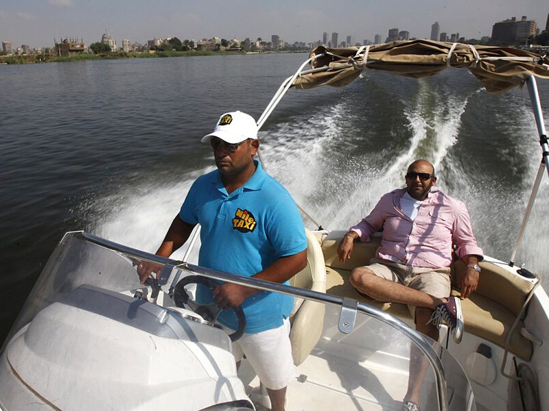 Jinja Adventure Guide 2026: 15 Insider Things to Do & Stays A high-speed jet boat cruising across the River Nile with a passenger enjoying the 90km/h surge in Jinja Uganda.