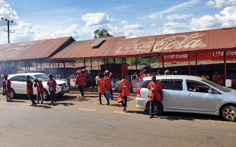  Roasted meat  and plantains at Namawojjolo roadside market on the highway to Mbale.